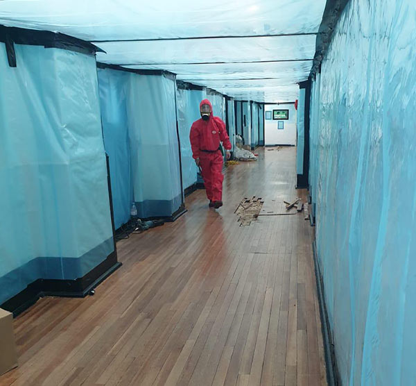 Asbestos removal from school corridor - removal phase