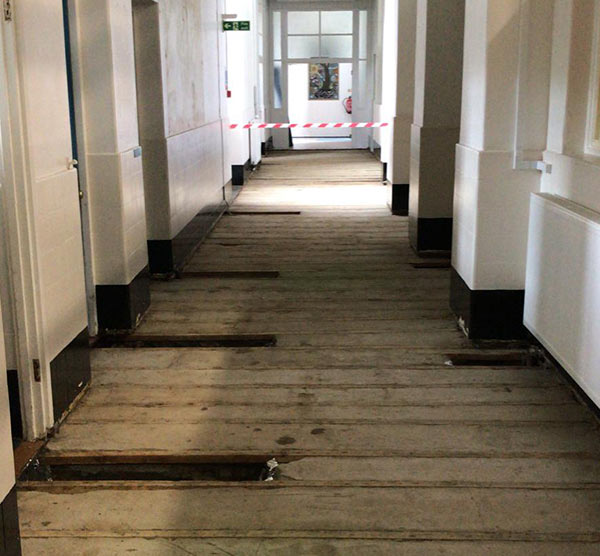 Asbestos removal from school corridor