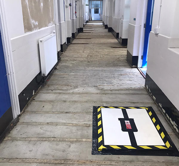 Asbestos removal from school corridor