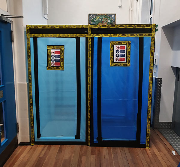 Asbestos removal from school corridor - enclosure construction