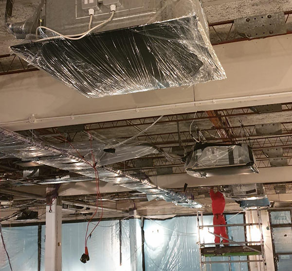 Asbestos removal and encapsulation