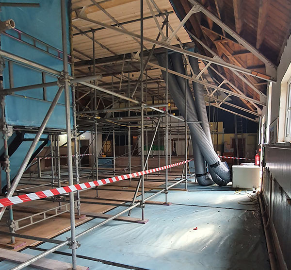 Asbestos removal from church using scaffolding