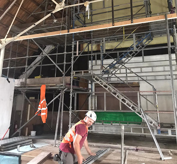 Asbestos removal from church using scaffolding