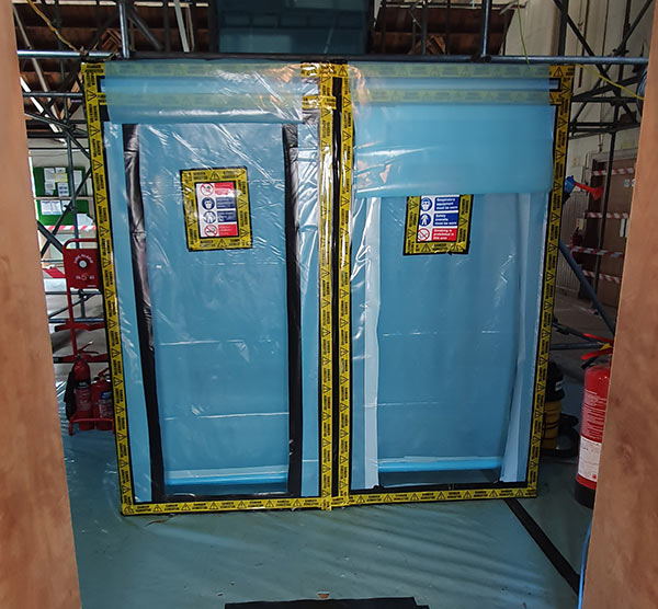 Asbestos removal from church - enclosure construction